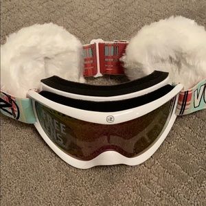 Snowboarding goggles and ear muffs